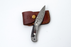 Hand-Forged Damascus Folding Knife | Engraved Bolster, Dark Wood Handle & Intricate Spine File Work TF-074