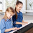 61-Key Folding Piano Keyboard with Full Size Keys and Music Stand-Black